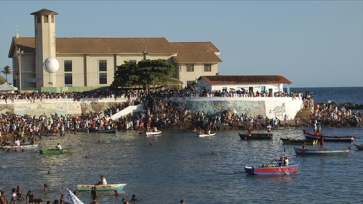 a group of people in boats in the water